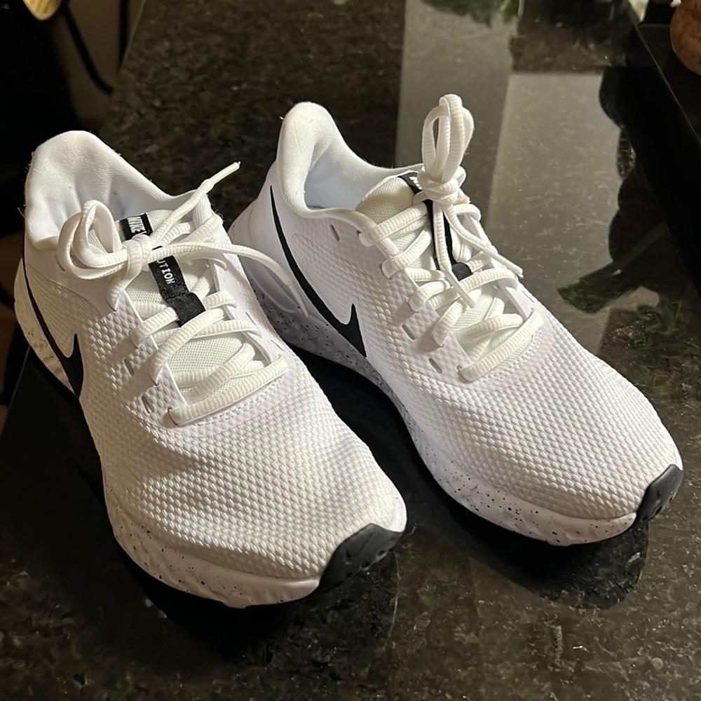 Nike Revolution running shoes DJ6009-100.super material fabric, rubber sole.